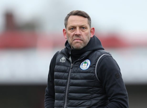 ACCRINGTON, ENGLAND - MARCH 20: Leam Richardson, Interim Manager of Wigan Athletic looks on as he makes his way across the pitch at the end of the first half during the Sky Bet League One match between Accrington Stanley and Wigan Athletic at The Crown Ground on March 20, 2021 in Accrington, England. (Photo by Lewis Storey/Getty Images)