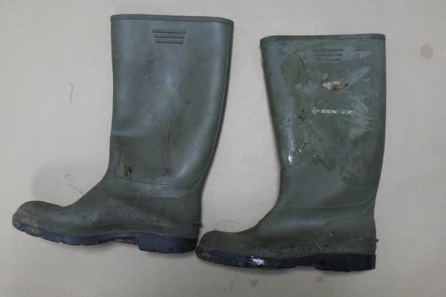 The man's green Wellington boots