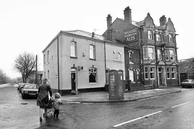 The Victoria Hotel and chip shop at the junction of Liverpool Road and Neville Street, Platt Bridge, in January 1985.