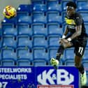 Michael Olakigbe in action for Latics at Chesterfield in the Vertu Trophy last month