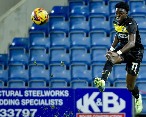 Michael Olakigbe in action for Latics at Chesterfield in the Vertu Trophy last month