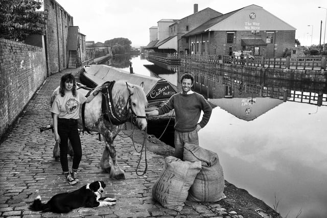 Professional explorer and television celebrity Nick Sanders resting at Wigan Pier on his journey from Liverpool to London by horse drawn barge and carrying cocoa beans following the historical canal trade route on Tuesday 6th of June 1989.
Nick had cycled around the world and travelled across the Sahara desert for charity causes and was accompanied by crew member Linda Hill and pulled along by his horse Crunchy on this venture.
