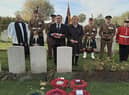 Stephen Gore and wife Julie at the rededication of Pte Parry's grave at Ypres