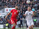 Curtis Tilt in action against MK Dons