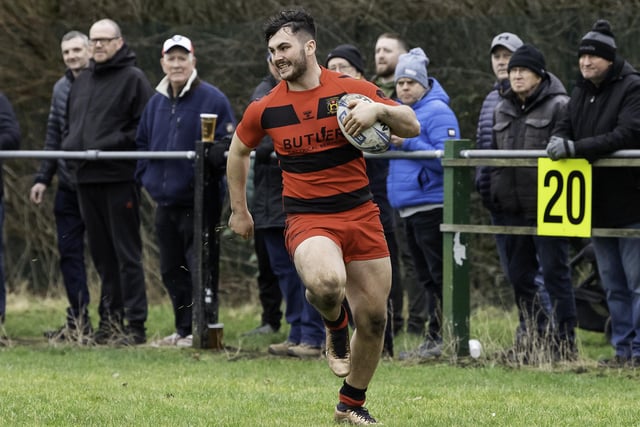 Callem Rodgers sprints off for a try for Ince Rose Bridge.