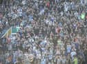 The Latics fans celebrate a famous victory at Birmingham