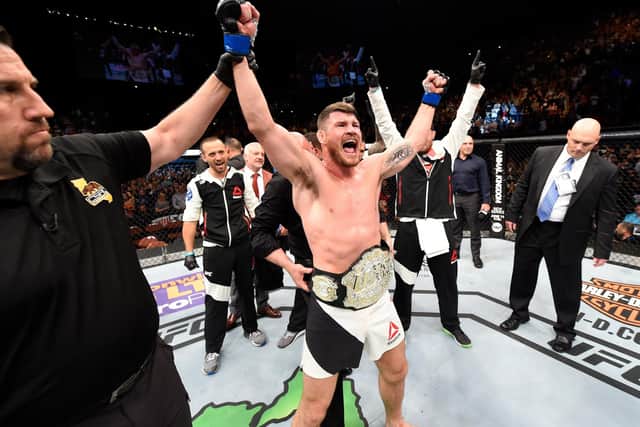 INGLEWOOD, CA - JUNE 04: Michael Bisping of England celebrates after his first round knockout win against Luke Rockhold in their UFC middleweight championship bout during the UFC 199 event at The Forum on June 4, 2016 in Inglewood, California.