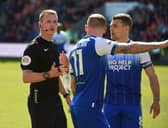 James McClean makes his thoughts very clear to referee Thomas Bramall