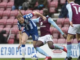 Shaun MacDonald in action for Latics against Aston Villa in March, 2017