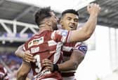Wigan's Kai Pearce-Paul celebrates with Toby King against Hull KR