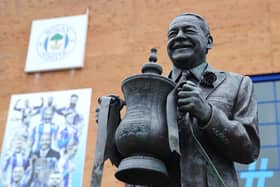 The Dave Whelan statue outside Wigan Athletic's home ground