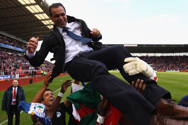 Manager Roberto Martinez celebrates victory with his team after the Barclays Premier League match at Stoke City