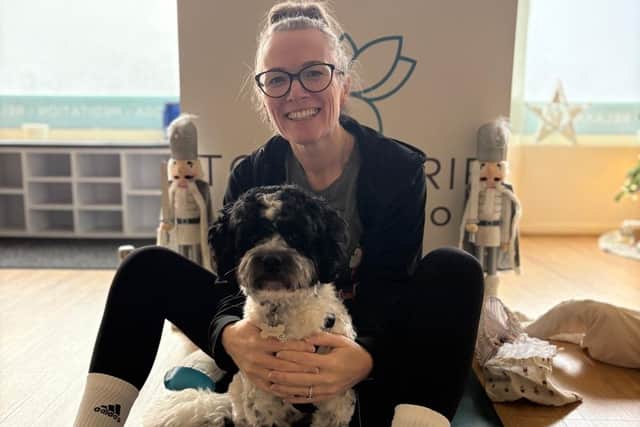 Toni with the studio therapy dog Stanley