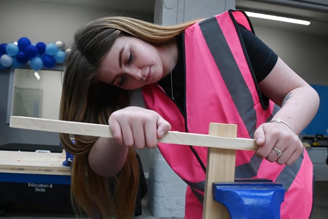 Learner Imogen Cunliffe demonstrates her joinery skills.