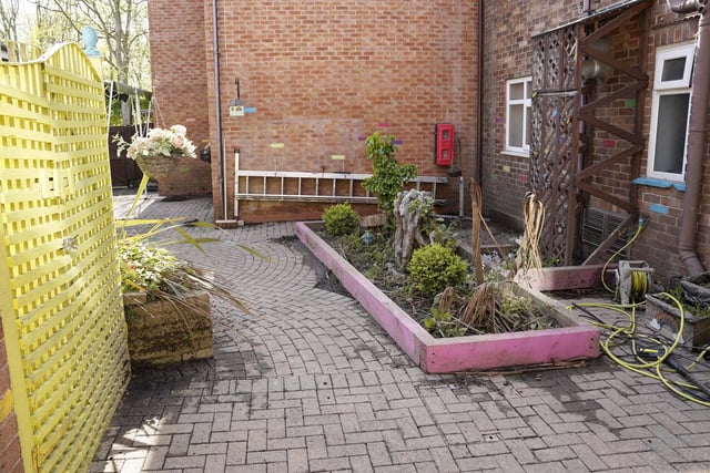 The outdoor space before.