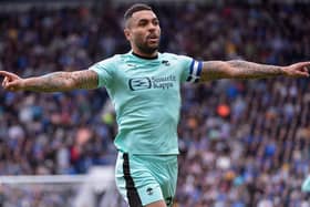 Josh Magennis marked his 500th career league game with the winning goal at Portsmouth at the weekend