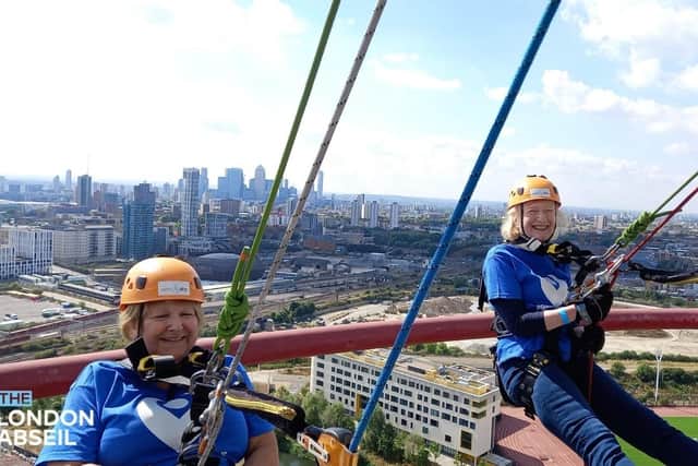 Julie and Janice abseil down the ArcelorMittal Orbit