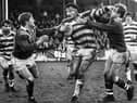 Wigan prop Brian Case battles through the St. Helens defence in the Good Friday league clash at Central Park on 1st of April 1983 which Wigan won 13-6.