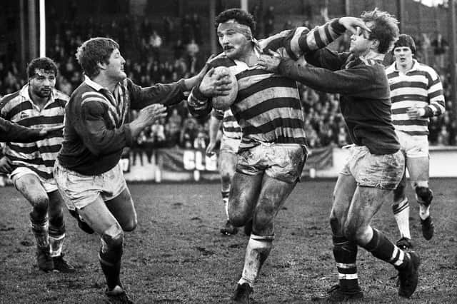 Wigan prop Brian Case battles through the St. Helens defence in the Good Friday league clash at Central Park on 1st of April 1983 which Wigan won 13-6.