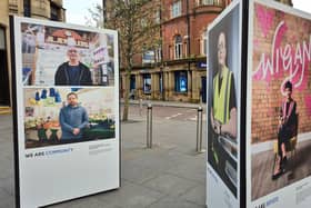 The triangle exhibition moves again this time its 'People Mek Wigin' ironically featuring two market traders.