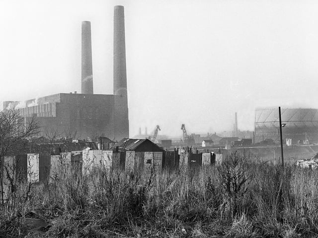 Westwood power station and the Wigan gasometer behind Chapel Street, Lower Ince, in December 1971.