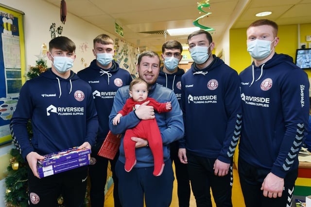 Wigan Warriors players Alex Sutton, Harvie Hill, Brad O’Neill, Jake Wardle and Zach Eckersley meet visit young patients to give out Christmas selection boxes on the Rainbow Ward at Wigan hospital.