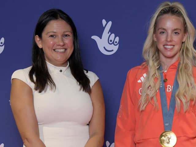 Keely Hodgkinson, pictured with Wigan MP Lisa Nandy, shows off her Olympic gold medal