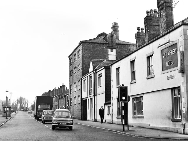 The Wheatsheaf Hotel and Almond's brewery on the corner of School Lane at its junction with Preston Road, Standish, in December 1971.