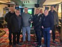 Colin Holland receives the Community Champion award from councillors Chris Ready and Ron Conway and members of Aspull Forum