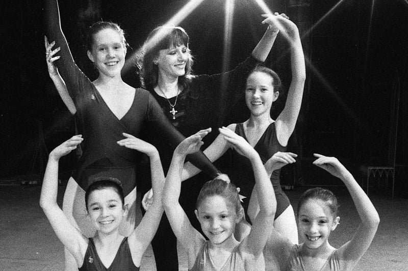 A master class with the Moscow City Ballet for girls from Wigan's Betty Buckley dance school.  Ballet mistress, Ludmilla Nerubashenko, helping Deborah Norris and Nicola Wadeson, back, and front, Karina Harrison, Hannah Bradburn and Louise Fairhurst at the Palace Theatre, Manchester.