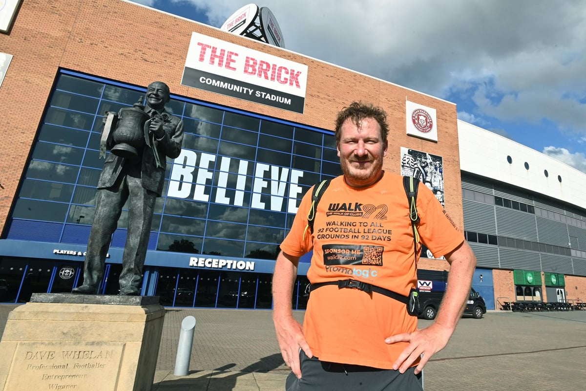 Football fan visits Wigan Athletic's ground on walk to all 92 league clubs