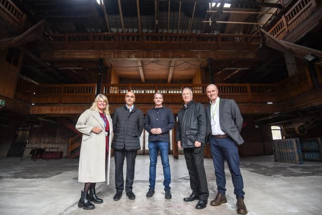 L-R Chief Executive of Wigan Council, Alison McKenzie-Folan, Step Places managing director Harinder Dhaliwal, GMCA night-time economy advisor, Sacha Lord, Leader of Wigan Council, David Molyneux and David Proctor assistant director for planning regeneration Wigan council, on a tour of Wigan Pier buildings last October.