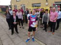 Martin Foster with staff at Wigan and Leigh Hospice
