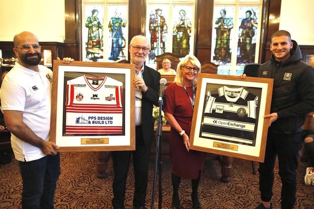 The touring party was presented with framed Leigh Centurions and Wigan Warriors shirts during the ceremony.