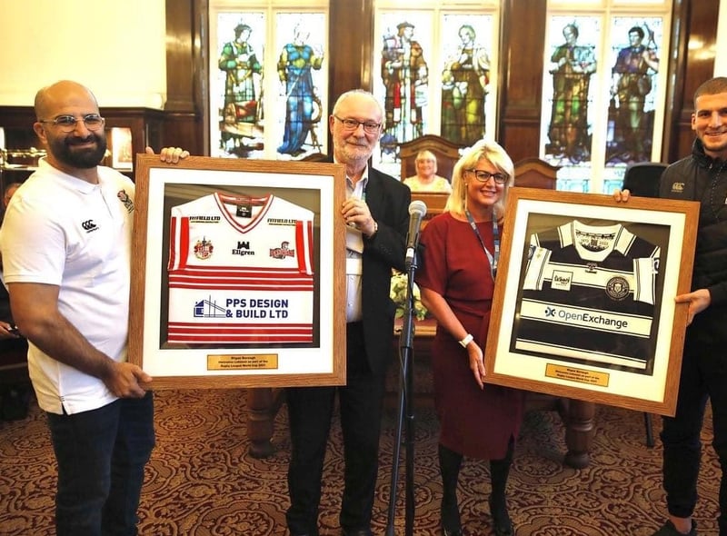 The touring party was presented with framed Leigh Centurions and Wigan Warriors shirts during the ceremony.
