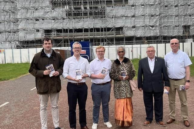 Conservatives line up outside the under-restoration Haigh Hall, from left, former Standish councillor Adam Marsh, Lord Stephen Parkinson of Whitley Bay, Wigan Conservative candidate Henry Mitson, vice-chair of Wigan Conservatives Yamini Gupta, and Richard Mitson, the candidate's father