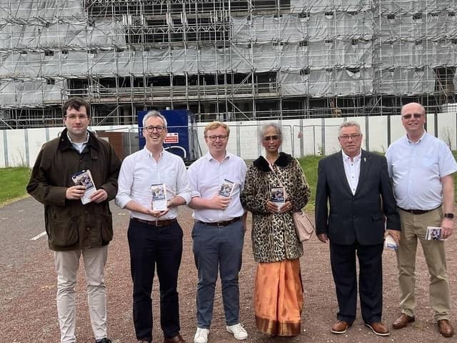 Conservatives line up outside the under-restoration Haigh Hall, from left, former Standish councillor Adam Marsh, Lord Stephen Parkinson of Whitley Bay, Wigan Conservative candidate Henry Mitson, vice-chair of Wigan Conservatives Yamini Gupta, and Richard Mitson, the candidate's father