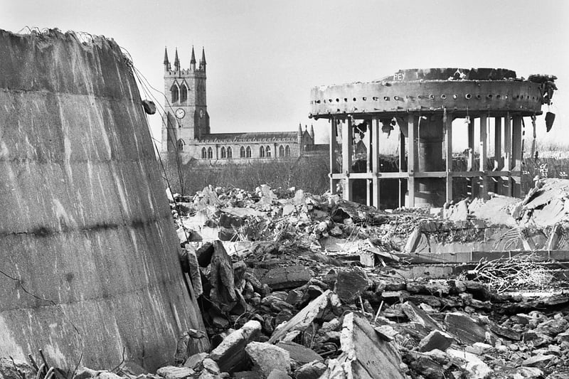 For 40 years the twin cooling towers dominated the skyline near Poolstock but now all that was left after the 9,000 ton towers were blasted off the landscape were piles of rubble and two metal rings on stilts with St. James Church peeping through.