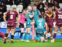 Wigan Warriors overcame Huddersfield Giants