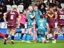 Wigan Warriors overcame Huddersfield Giants