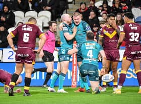 Wigan Warriors overcame Huddersfield Giants
