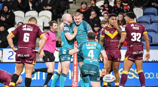 Wigan Warriors overcame Huddersfield Giants