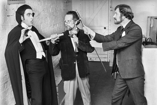 A scene from Wigan Little Theatre's production of "Dracula" on Friday 28th of October 1977 with Paul Buer as Dracula, Peter Bartlett as Professor Van Helsing and Jim Stirrup as Jonathan Barker.
