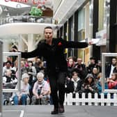 A fashion show, music, dancing and stalls at the Fashion-Easter event, organised by Rebuild with Hope and The Brick, held at Rebuild with Hope shop and in the shopping centre The Grand Arcade, Wigan.