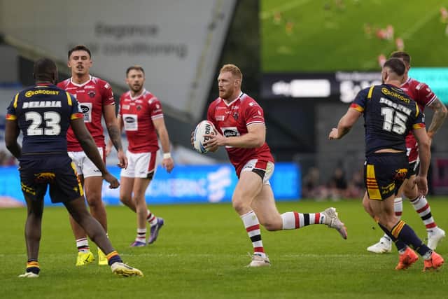 Joe Bullock has completed a permanent move to Salford Red Devils