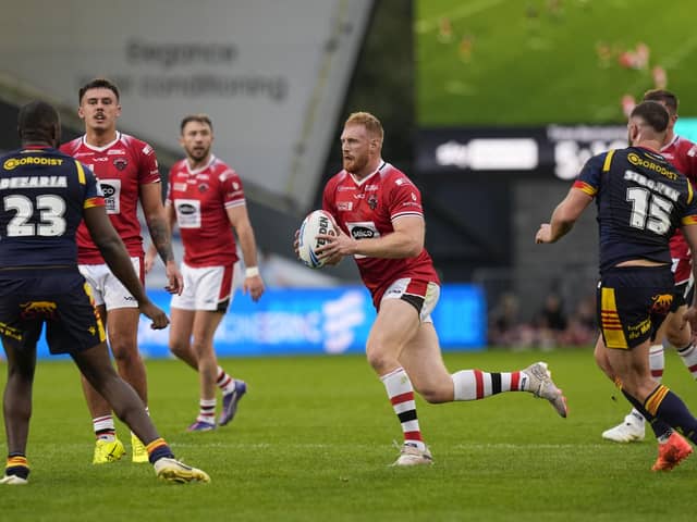 Joe Bullock has completed a permanent move to Salford Red Devils