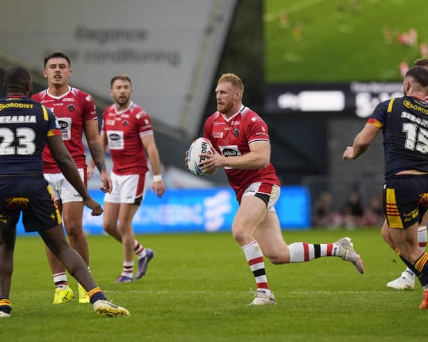 Joe Bullock has completed a permanent move to Salford Red Devils