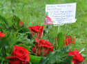 Members of the community attend the 10th annual Workers' Memorial Day, with a ceremony around the memorial tree and plaque in Mesnes Park, Wigan.