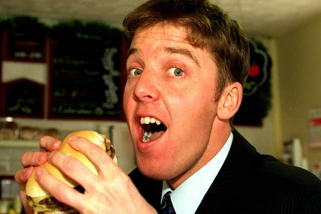 Neil samples a butty at TheVillage Kitchen Sandwich shop in Standish in 1998