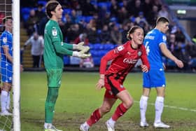 Thelo Aasgaard wheels away after scoring goal number three at Peterborough on Saturday